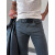 Čierne pánske rifle slim fit s opaskom